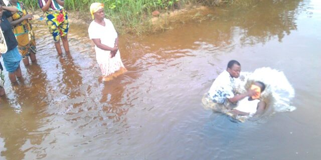 Evangelist Guah baptizes new converts