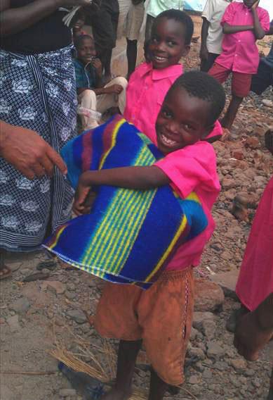 Thankful and very happy after receiving a Blanket.